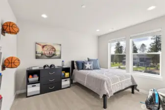 One of the 6 bedrooms overlooking the protected meadow area!