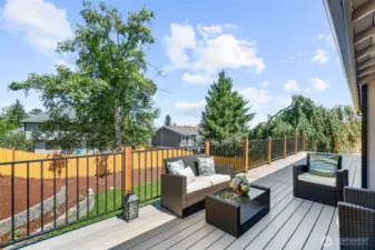 Deck extends across dining and primary bedroom.