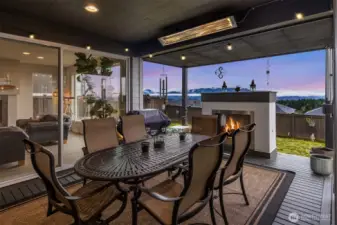 Remarkable outdoor living retreat, fireplace, built-in heater, and views!!