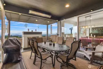 Remarkable outdoor living retreat, fireplace, built-in heater, and views!!