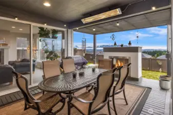 Remarkable outdoor living retreat, fireplace, built-in heater, and views!!