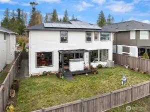 Easy-care Backyard showing Solar Panels for effortless living.