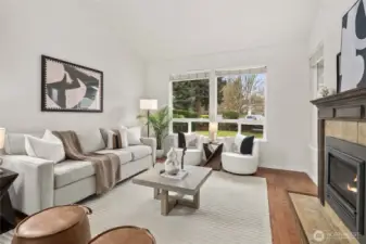 Vaulted ceilings create an open, airy feel throughout the main living space.