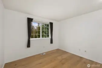 Warm, inviting with oak plank floors