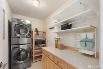 Laundry room with additional storage