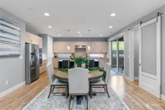 The sliding glass doors lead out to the covered patio and backyard.