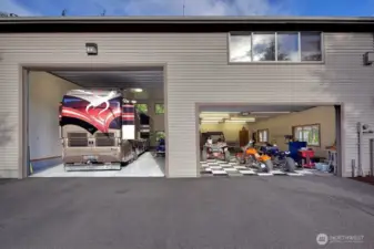 THIS attached garage will accommodate LOTS of your whatevers !