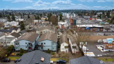 Townhome for sale right center forefront of photo looking south to downtown Seattle