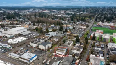 looking east towards the Cascade mountains in the distance.  Licton Springs elementary school to the right, North Seattle college and Northgate upper left of photo view