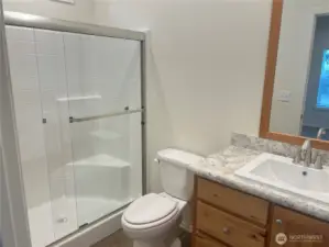 Primary bathroom with walk in shower.
