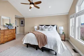 Spacious Primary suite features vaulted ceilings, an entry landing, a big walk in closet and Lake Sammamish views