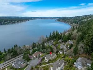 This home is part of a private small community beach with 100 ft of beach front, a dock and mooring balls for your boat.   Don't miss this Lake Sammamish opportunity!