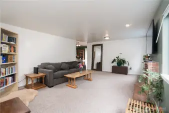 The living room offers a lovely blend of contemporary comfort & classic warmth.
