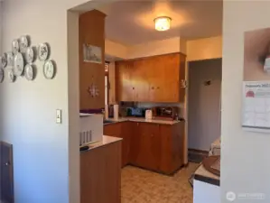 Kitchen leads to dining room
