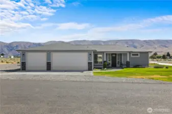Located on the north side of the runway in  sunny Desert Aire, WA, you will appreciate  1-level living in this like-new open concept  home with its 3-car garage and AMAZING  views of Yakima Ridge with it's gorgeous  sunsets!
