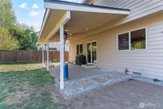 Covered patio and fresh stone landscaping