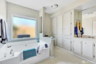Soaking tub was resurfaced and ready for you to enjoy a bubble bath and relax. Tons of storage cabinets for all your linens and bath necessities.
