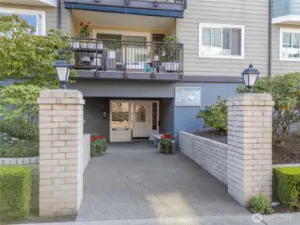 Secured front entrance with callbox.