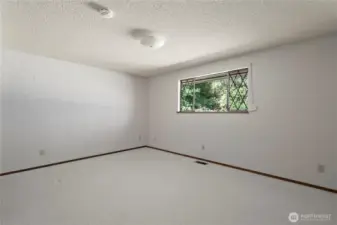 Bedroom two with large closet. windows all have roll down shutters for blocking out light if desired or closing up the house. See virtual tour link for 3D walkthrough video, interactive floor plans and more.
