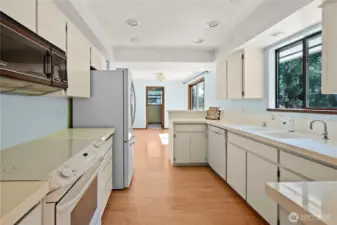 Beautiful well designed kitchen, with corian countertops and plenty of cabinet space.