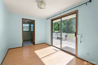 The breakfast nook and the door to the laundry room.