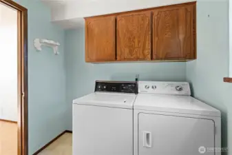 Laundry room, with additional closet space and door to the back deck, see virtual tour link for 3d tour and walk through. See virtual tour link for 3D walkthrough video, interactive floor plans and more.