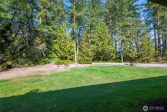 The view from the front porch toward the driveway entrance.