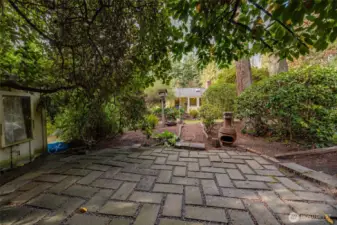 The "secret patio," where nature creates a quiet sanctuary for reflection or small gatherings.