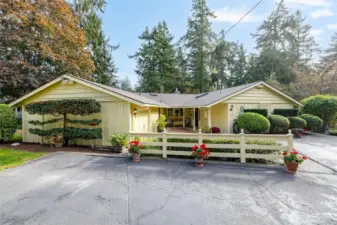 The front of the home showing a sample of the mature, meticulously cared for landscaping.