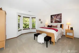 A spacious retreat designed for rest and renewal, with abundant natural light