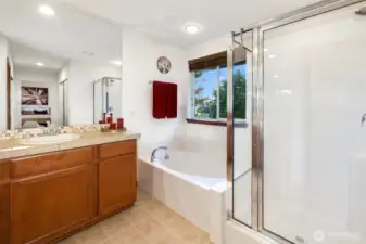 Your personal spa awaits — unwind in the soaking tub or refresh in the walk-in shower