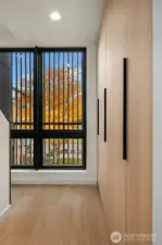 Laundry - Hidden with Sleek Cabinetry.
