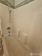 1 piece surround makes cleaning a breeze!