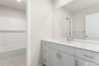 Guest Bathroom. Photos of previously built home of same floorplan. Colors, Specifications, and Options may vary on actual home.