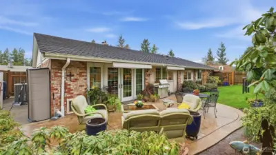 Relax, entertain, and enjoy every season in this backyard oasis