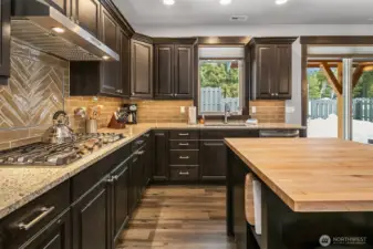 Large kitchen fully equipped. Gas cooktop, all appliances stay