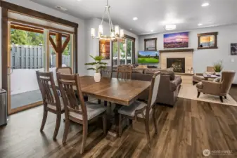 Dining table can extend to seat 12. Leaf in garage with extra chairs and bench