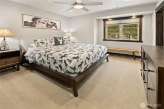 2nd bedroom with King bed, with TV, ceiling fan and ensuite 3/4 bath