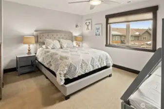 4th bedroom front view of Queen bed. All rooms have dressers and end tables and lamps