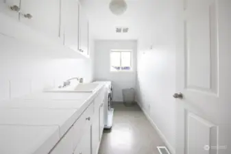 The good sized laundry room is conveniently located on the second level.