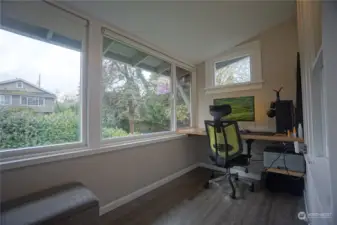 Top - Fully enclosed Sun Room next to the kitchen