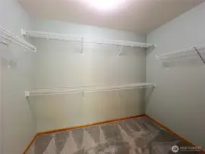 main floor primary bedroom walk-in closet