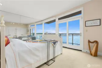 Primary bedroom with its own private balcony.