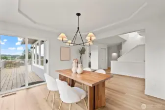 Dining room flows onto the deck.