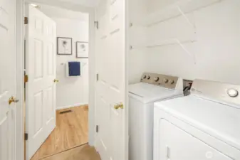 Full size washer and dryer. Large linen closet direct across.