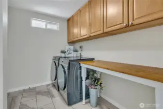 Laundry Room off the kitchen that leads to the garage.