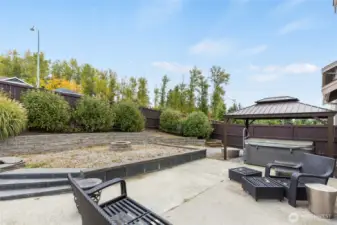 Fenced backyard, covered jacuzzi,