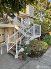 Lushly gardened stair to A204