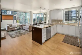 As you pass the entance hallway you are greeted by this light and bright great room home.