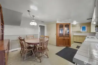 View of kitchen from kitchen entrance door. To the immediate left is the living room.